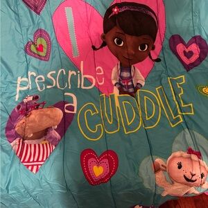 Disney Doc McStuffins Teal and Purple Fabric